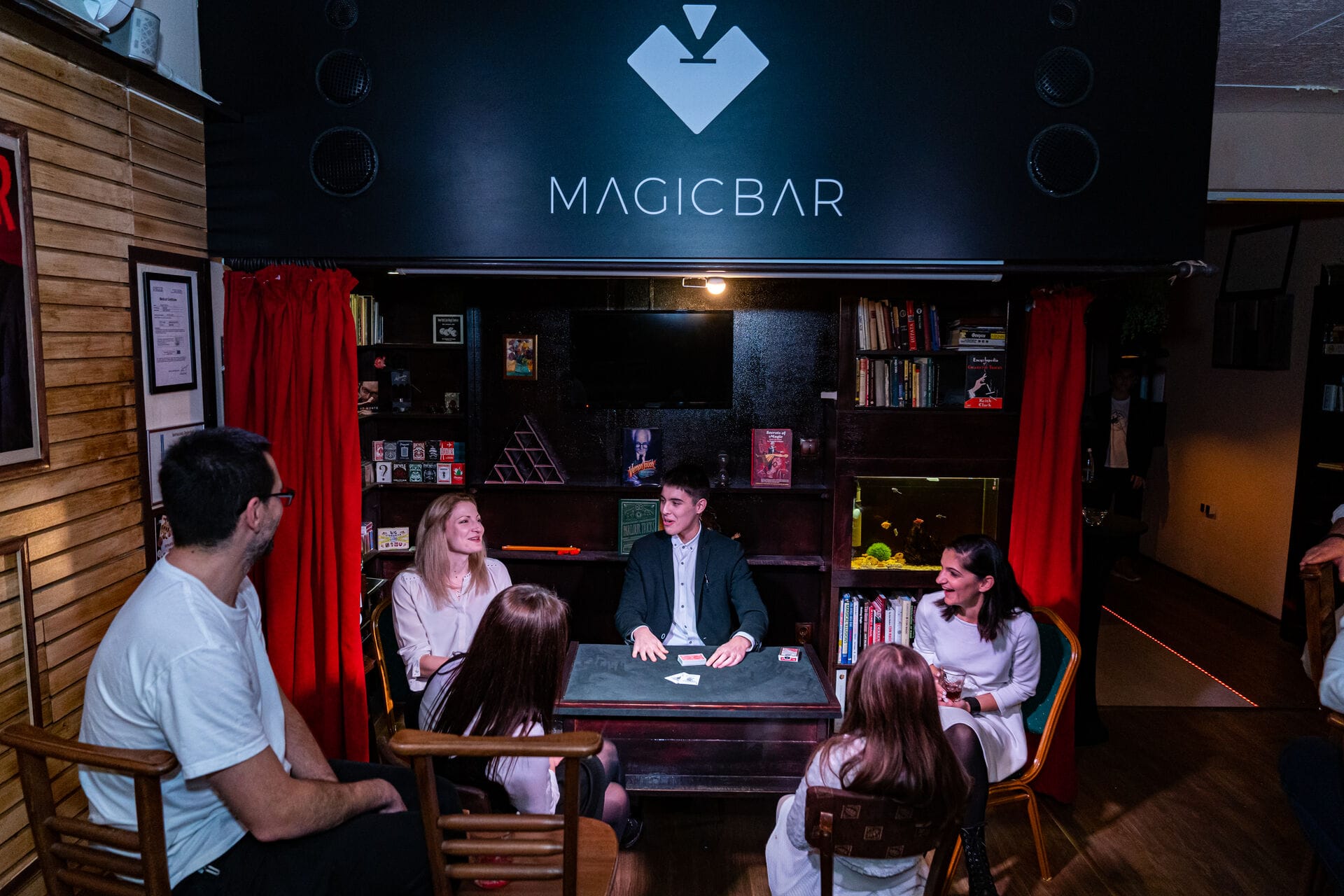 A full audience watching Rado Sheytanoff perform at the Magic Bar